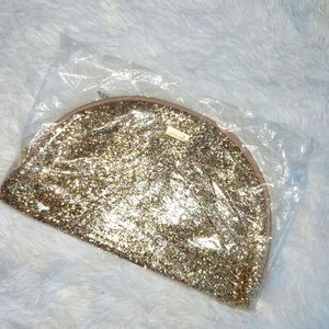NWT Tarte Rose gold glitter makeup bag with zipper closure. Bag is still sealed